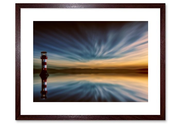 Lighthouse At Sunset Framed Print